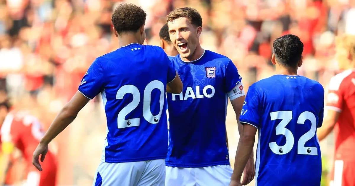Players celebrating during a football match