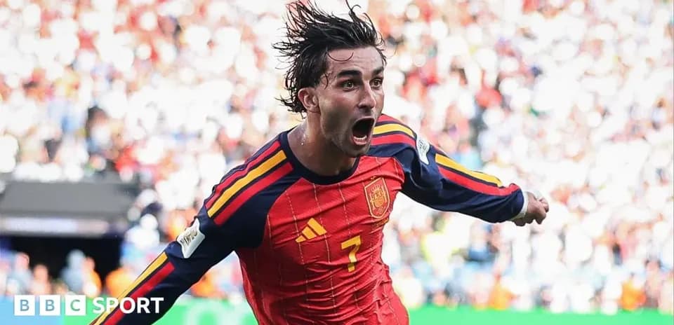 Player celebrating a goal for Spain during match