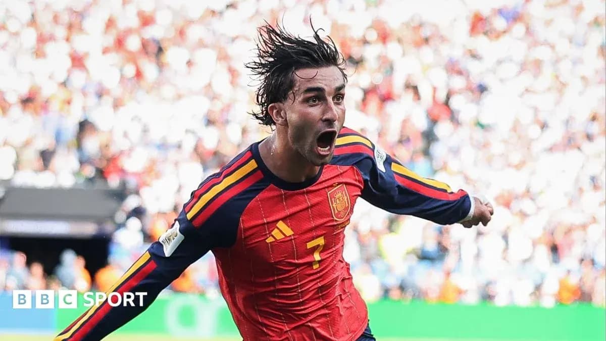 Player celebrating a goal for Spain during match