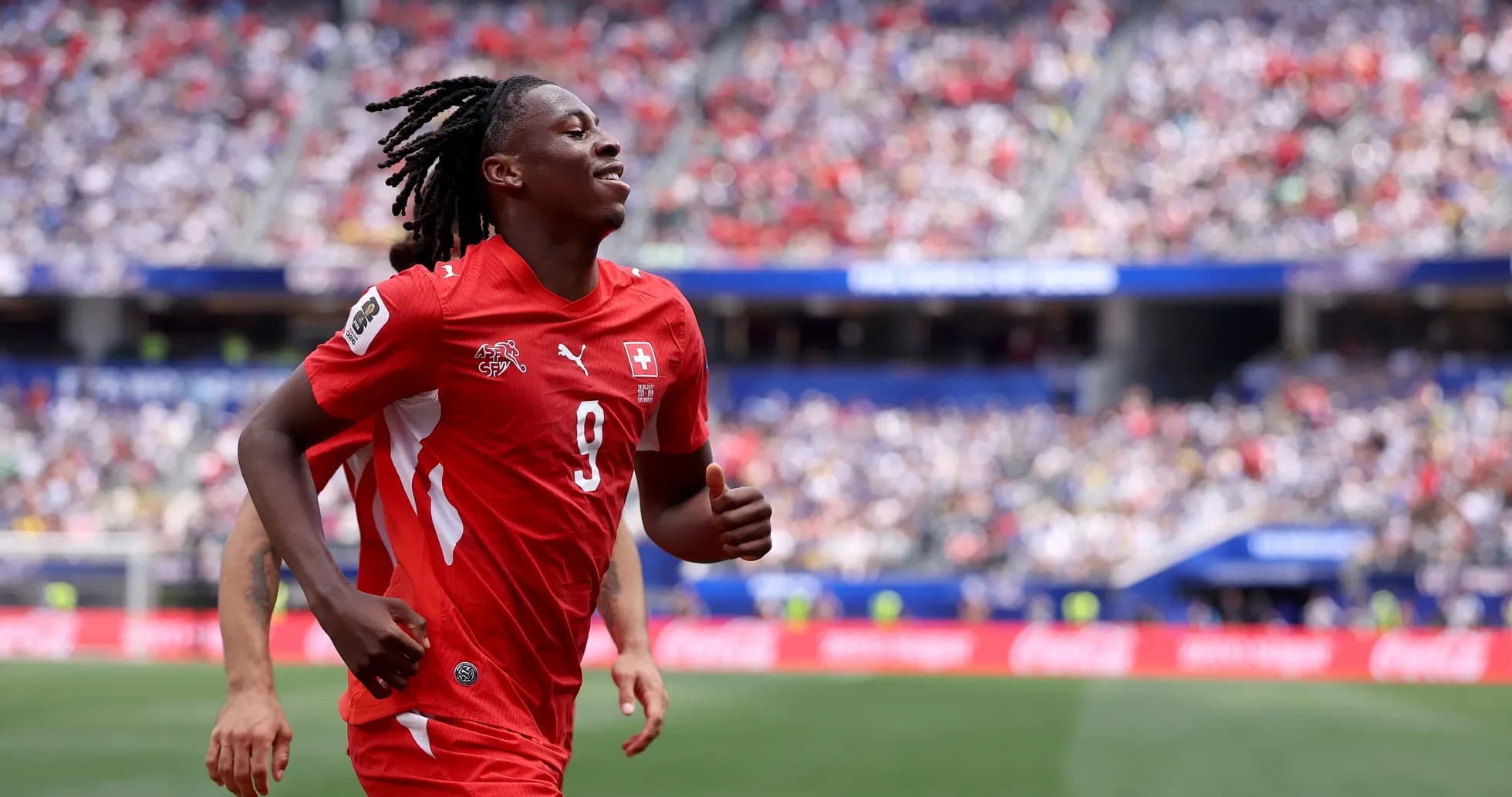 Player celebrating during a match in stadium