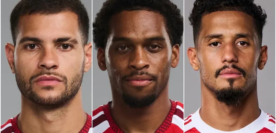 Three soccer players posing for headshots
