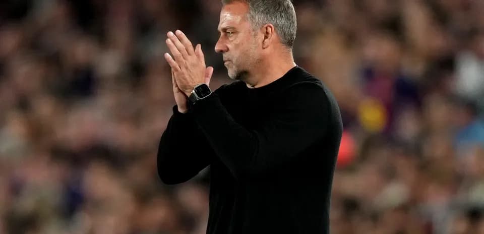Coach clapping during match at stadium