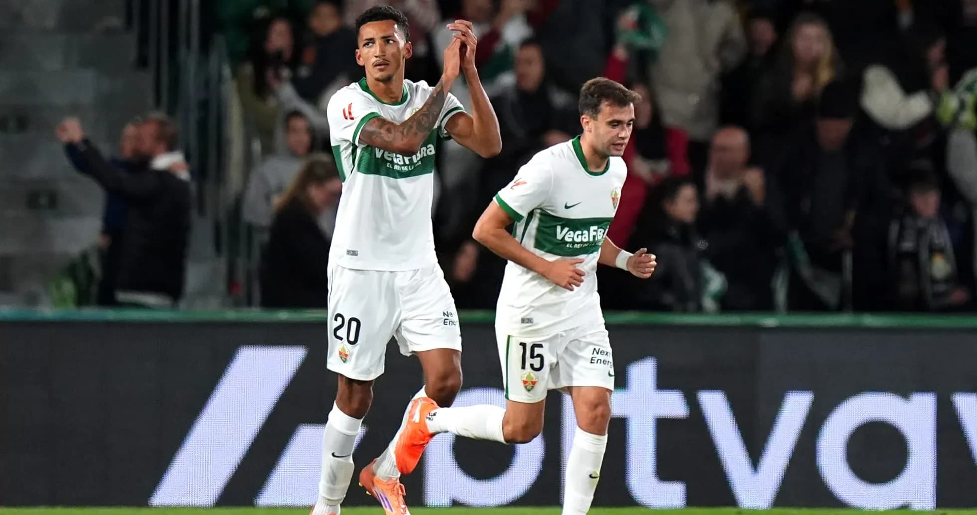 Elche players celebrating during La Liga match