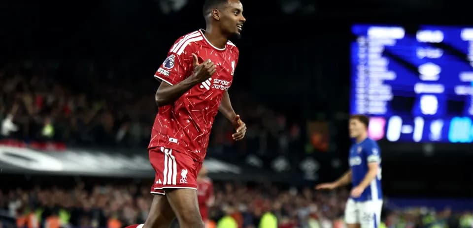 Liverpool player celebrating after scoring a goal