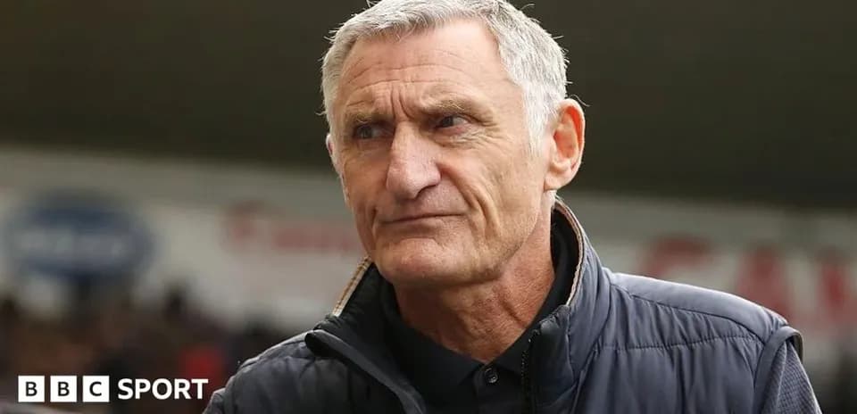 Manager in a sports venue during a match