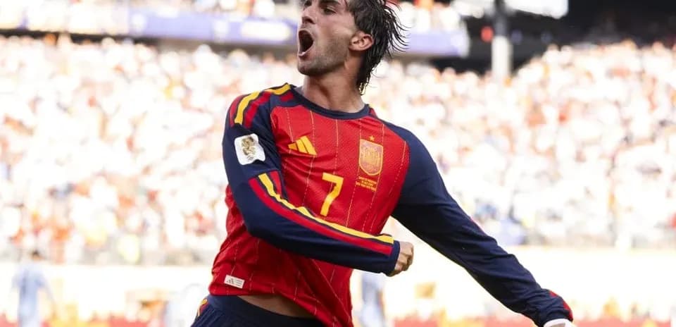 Player celebrating goal for Spain during match