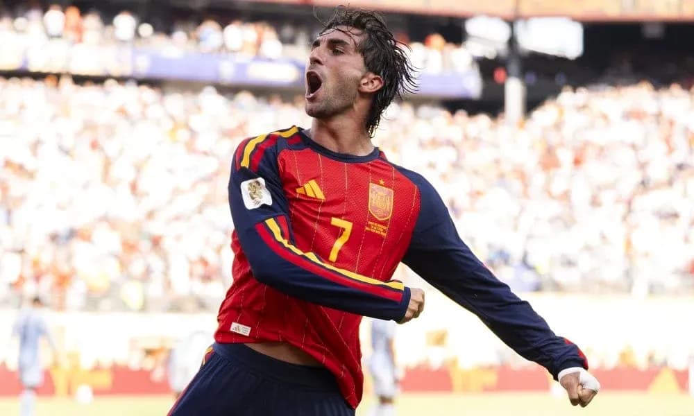 Player celebrating goal for Spain during match