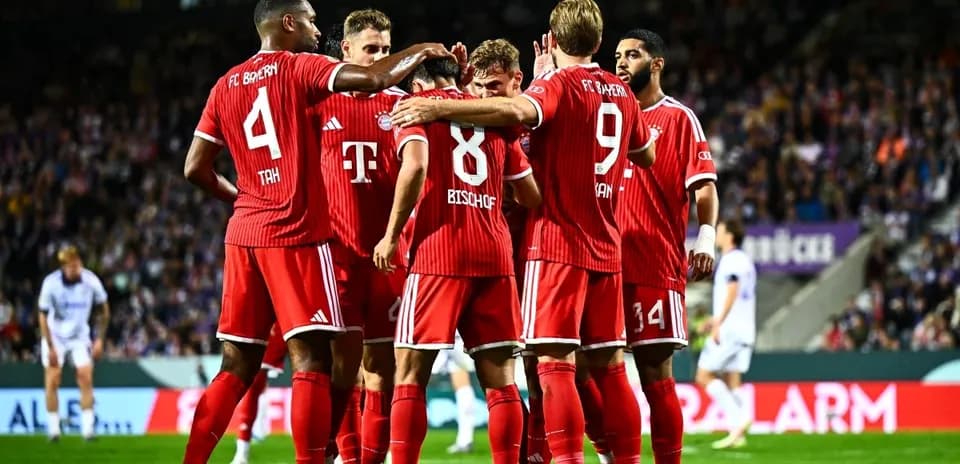 Bayern Munich players celebrating a goal together