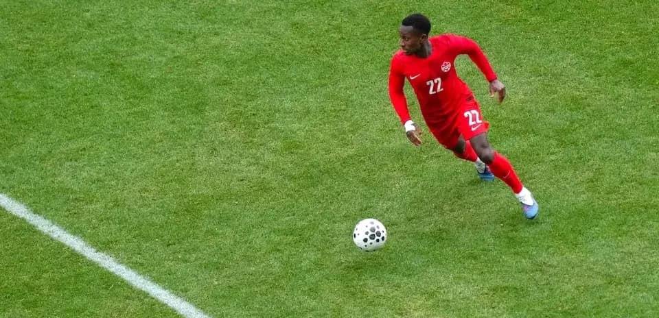 Player in red jersey during World Cup qualifying match