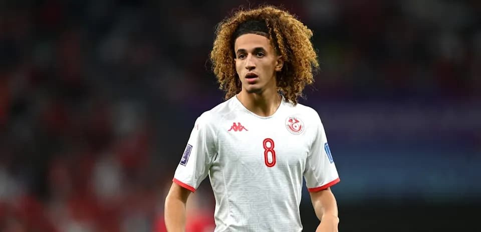 Player wearing Tunisia jersey during match
