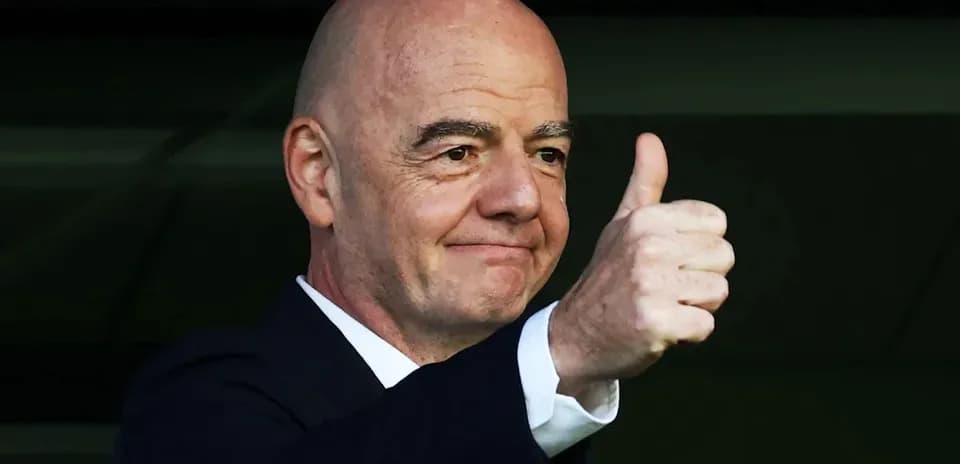 Official giving a thumbs up gesture