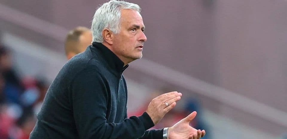 Coach directing players during a match