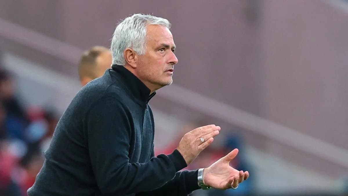 Coach directing players during a match