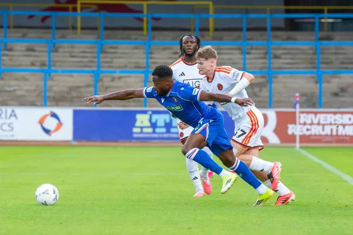 Player tackling opponent while ball is nearby