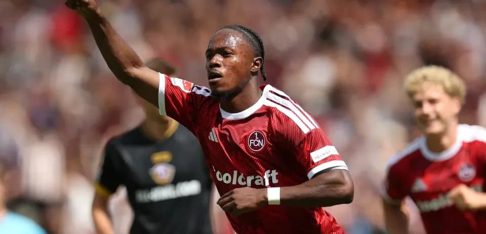 Player celebrating after scoring a goal during match