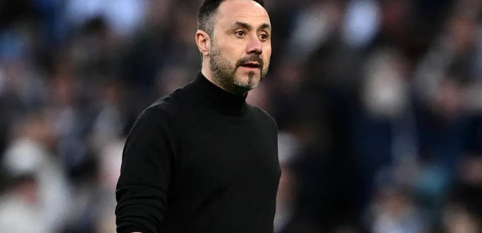 Manager observing the game from the sideline