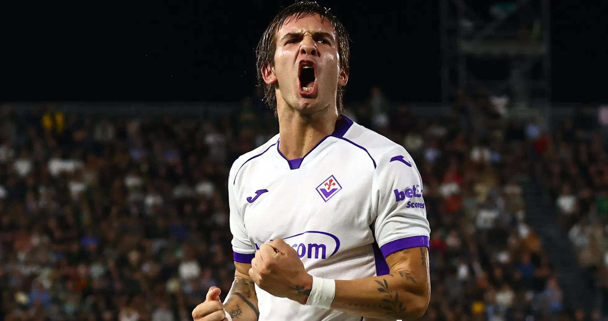 Player celebrating a goal with clenched fist