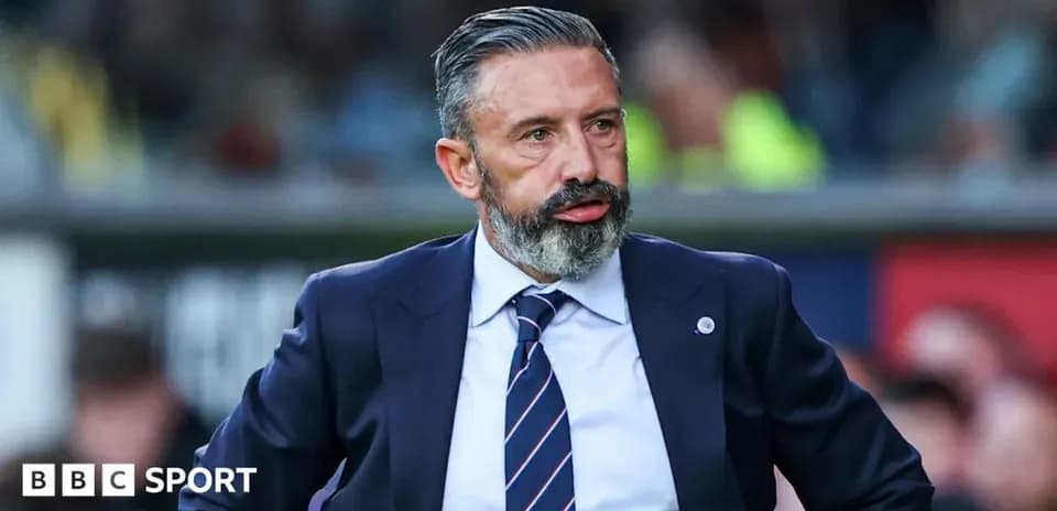 Manager observing the match from the sidelines