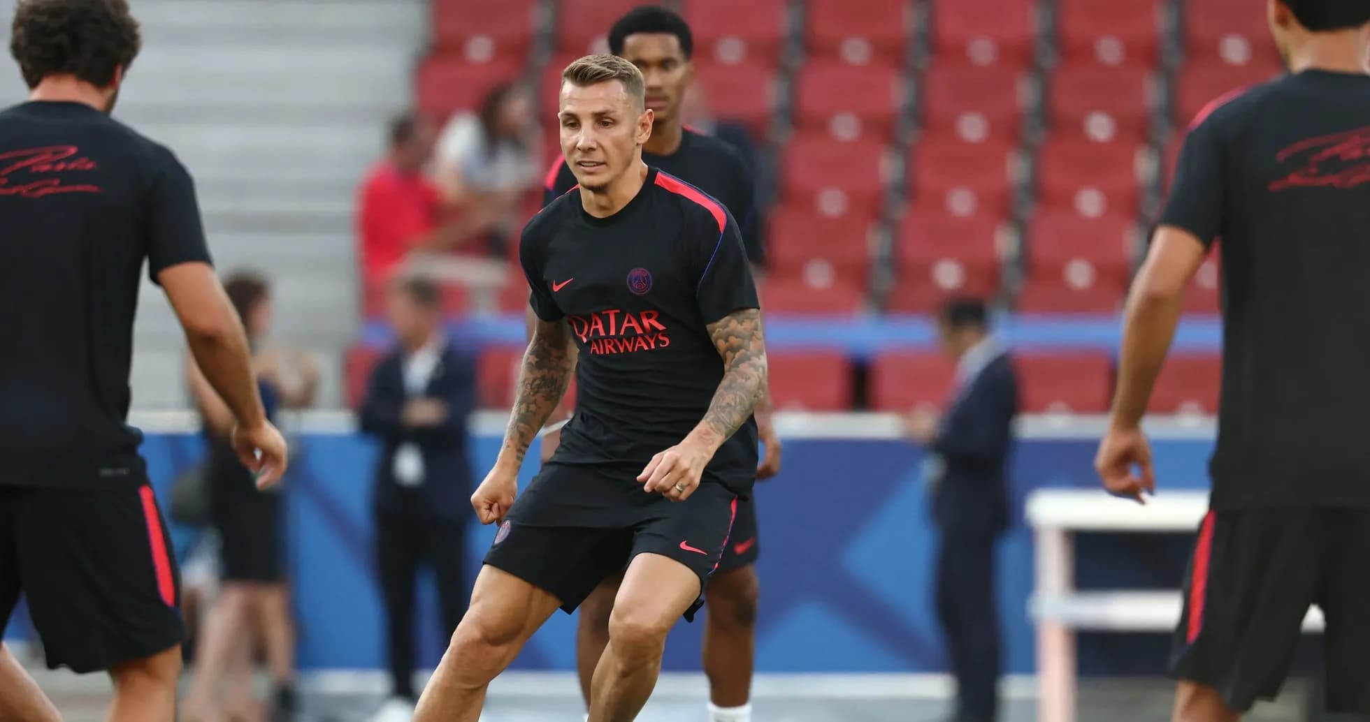 Player training during warm-up session on pitch