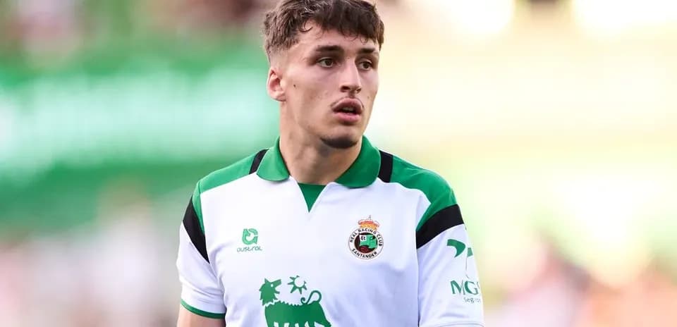 Player in Racing Santander jersey on field