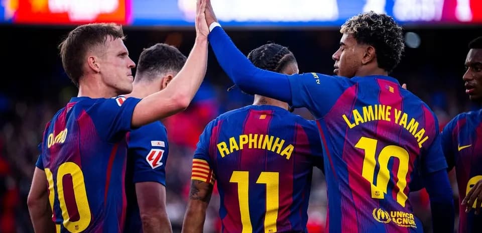 Barcelona players celebrating a goal during match