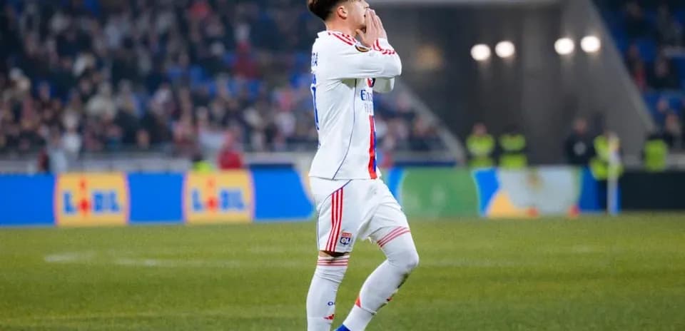 Player gesturing during a football match on field
