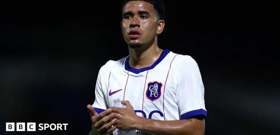 Player holding water bottle during match