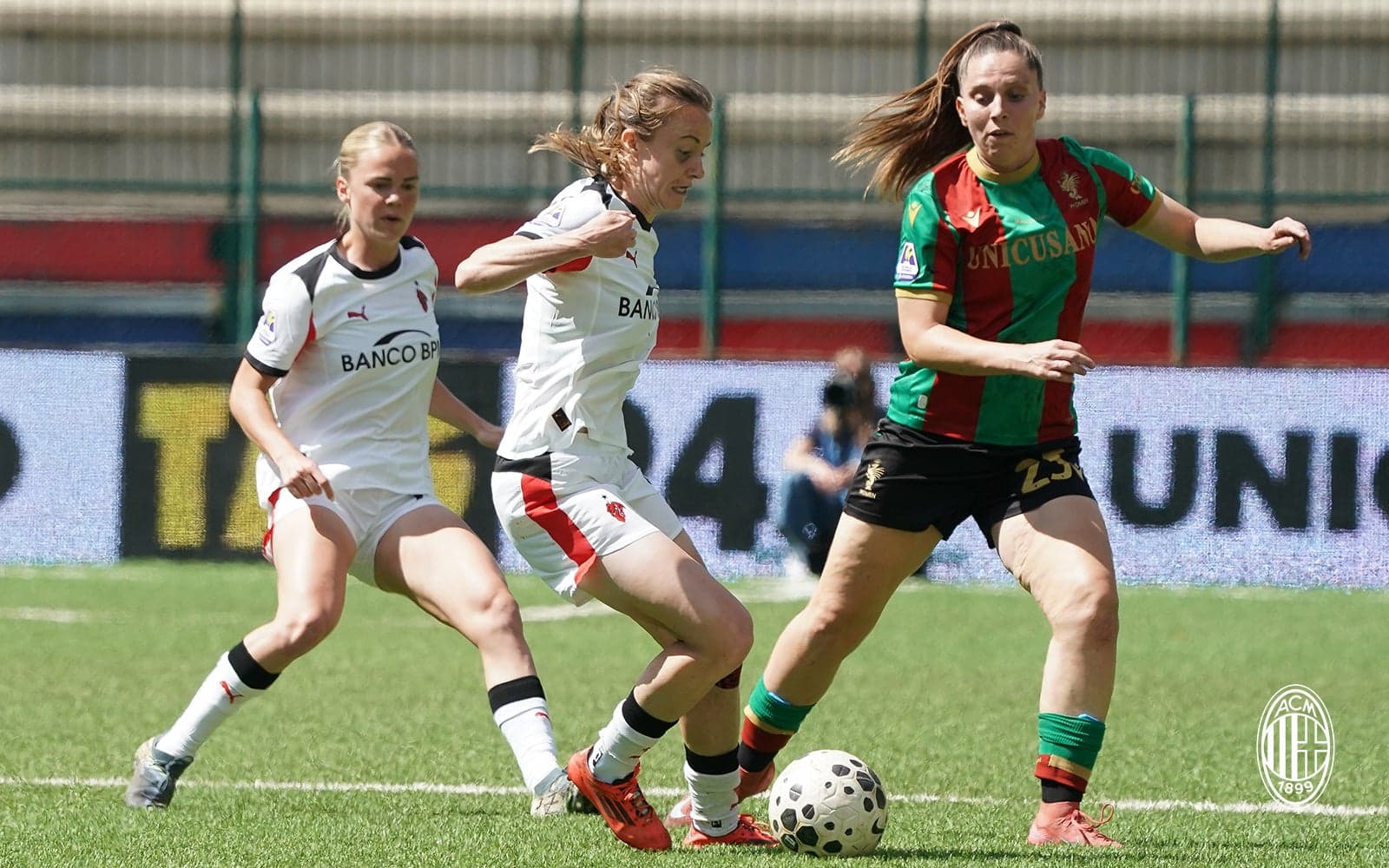 Players competing for the ball during match
