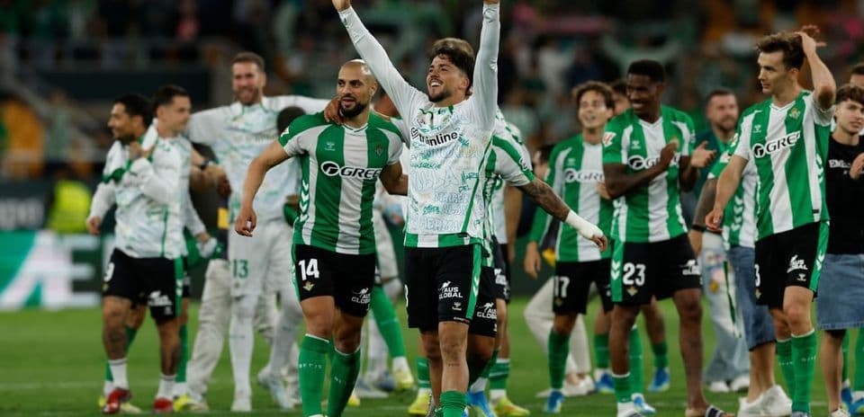 Real Betis players celebrating victory on the pitch
