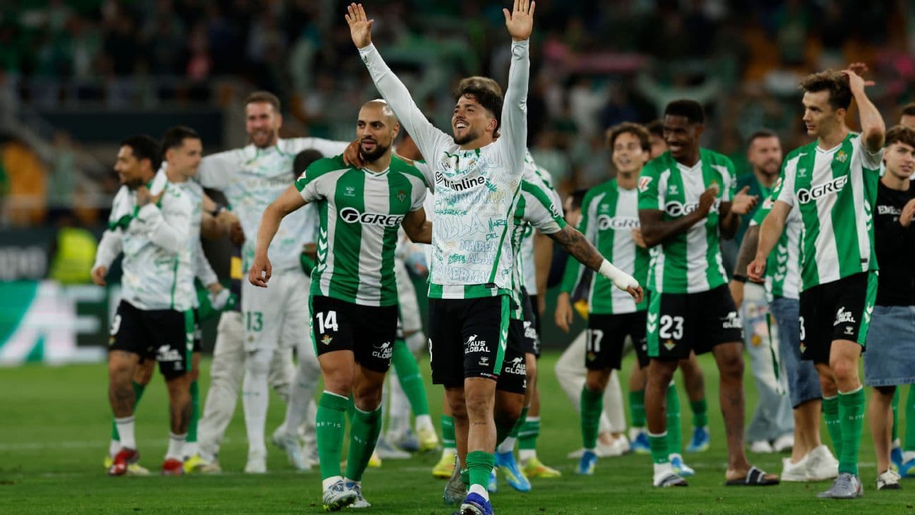 Real Betis players celebrating victory on the pitch