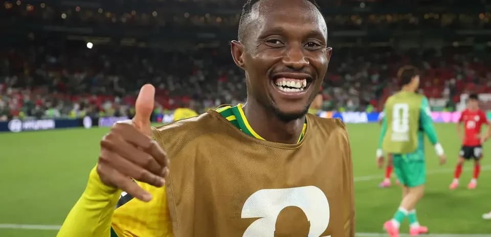 Player celebrating with thumbs up after match