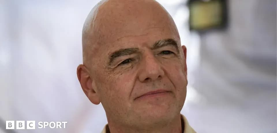 Man with bald head in casual shirt