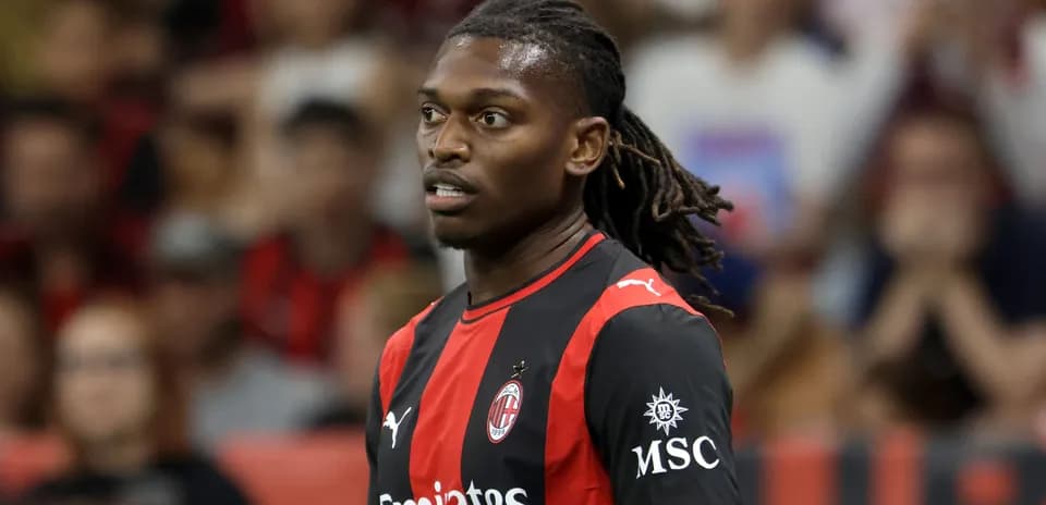 Player in AC Milan jersey during match
