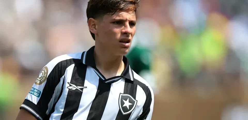 Player in black and white striped jersey during match