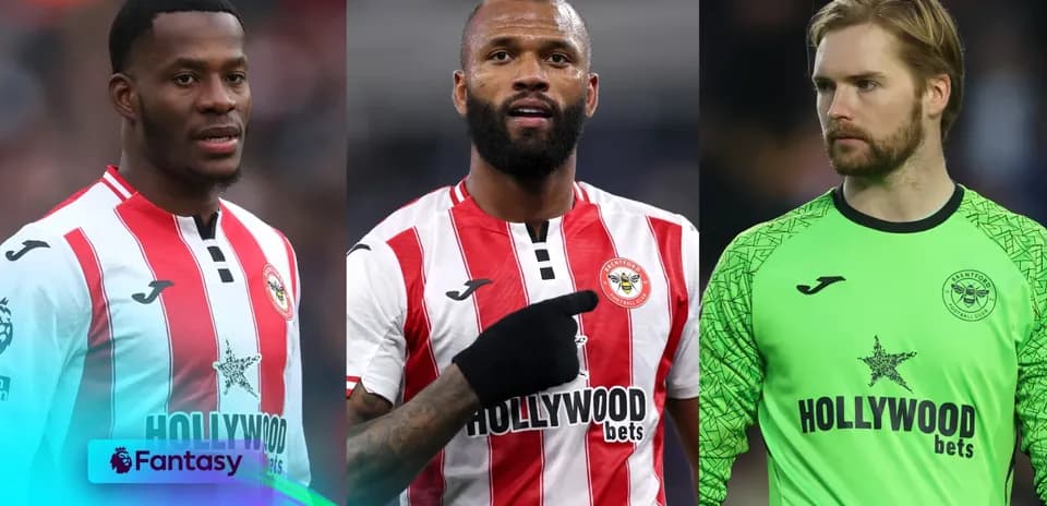Three Brentford players in team kits during match