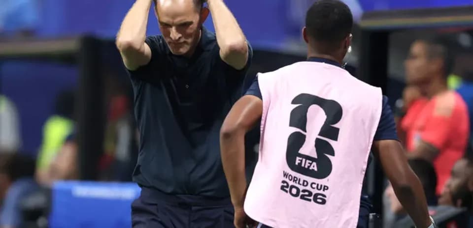 Coach showing frustration during a match on sidelines