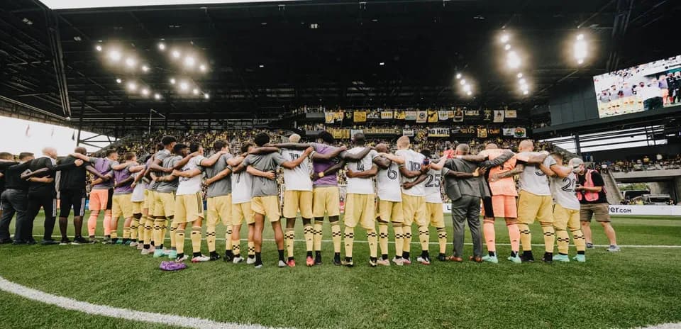 Columbus Crew players in pre-match huddle