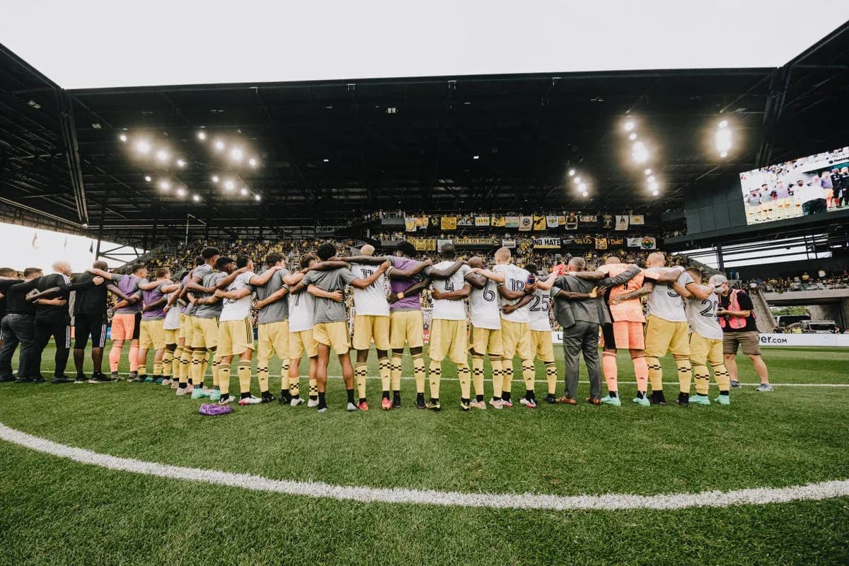 Columbus Crew players in pre-match huddle