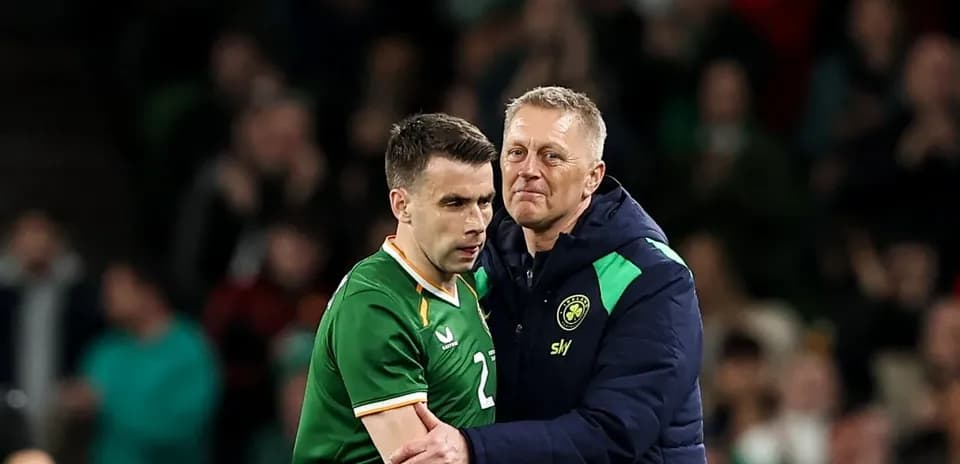 Player receiving support from coach during match