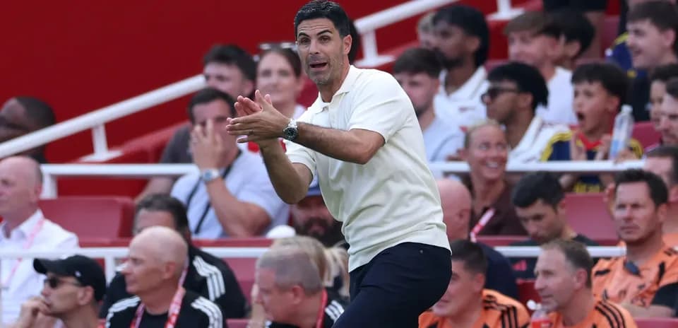 Manager giving instructions from the sidelines during match
