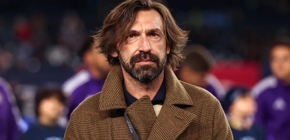 Coach standing on the sidelines before the match