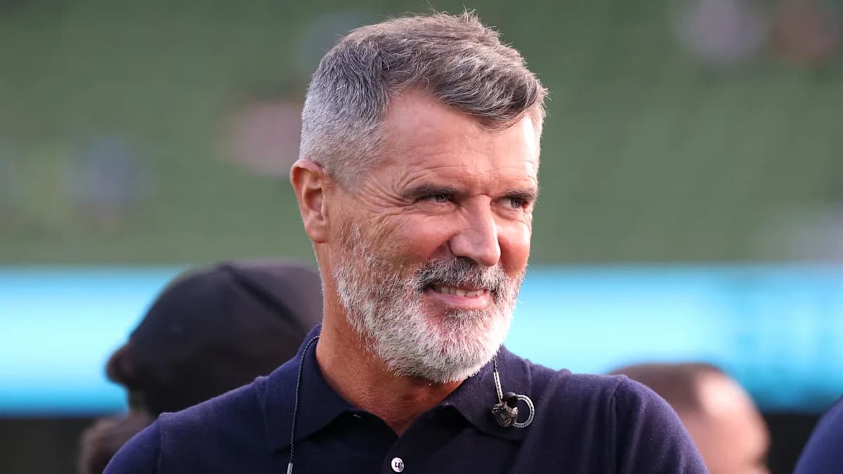 Man with grey beard smiling at event