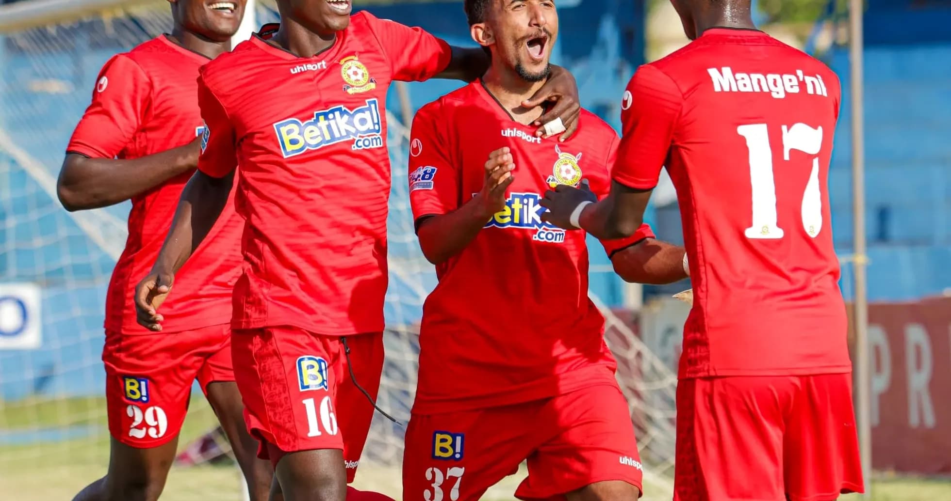 Players celebrating a goal during FKF Premier League match