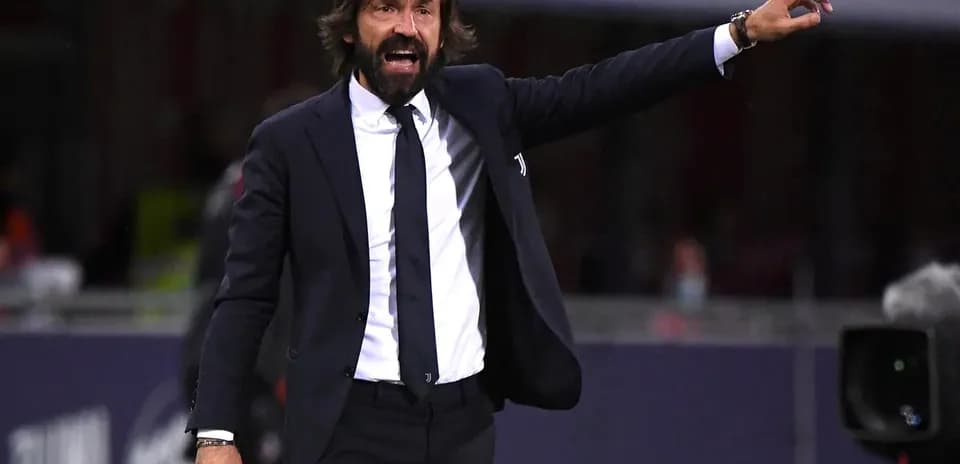 Coach gesturing during a match on the sidelines