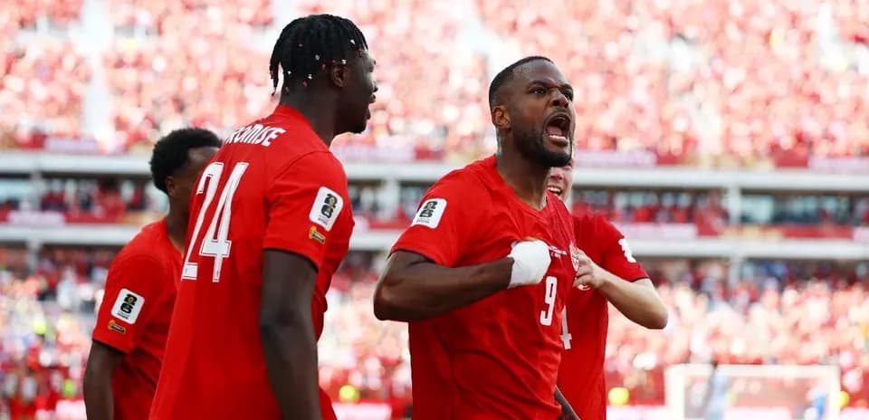 Canadian players celebrating a goal during match