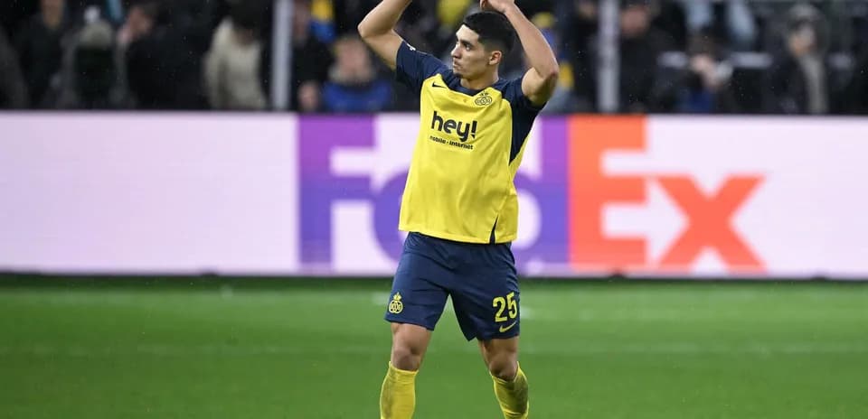 Player celebrating on the field during a match