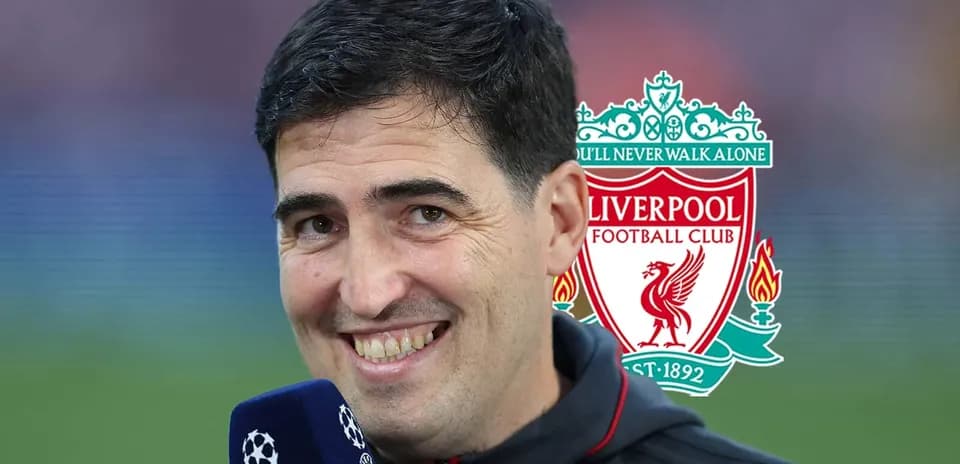 Person speaking into microphone with Liverpool logo background
