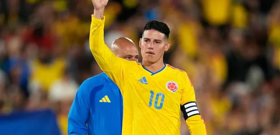 Player waving while wearing Colombia national team jersey