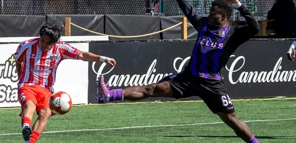 Player kicking ball during Atlético Ottawa match