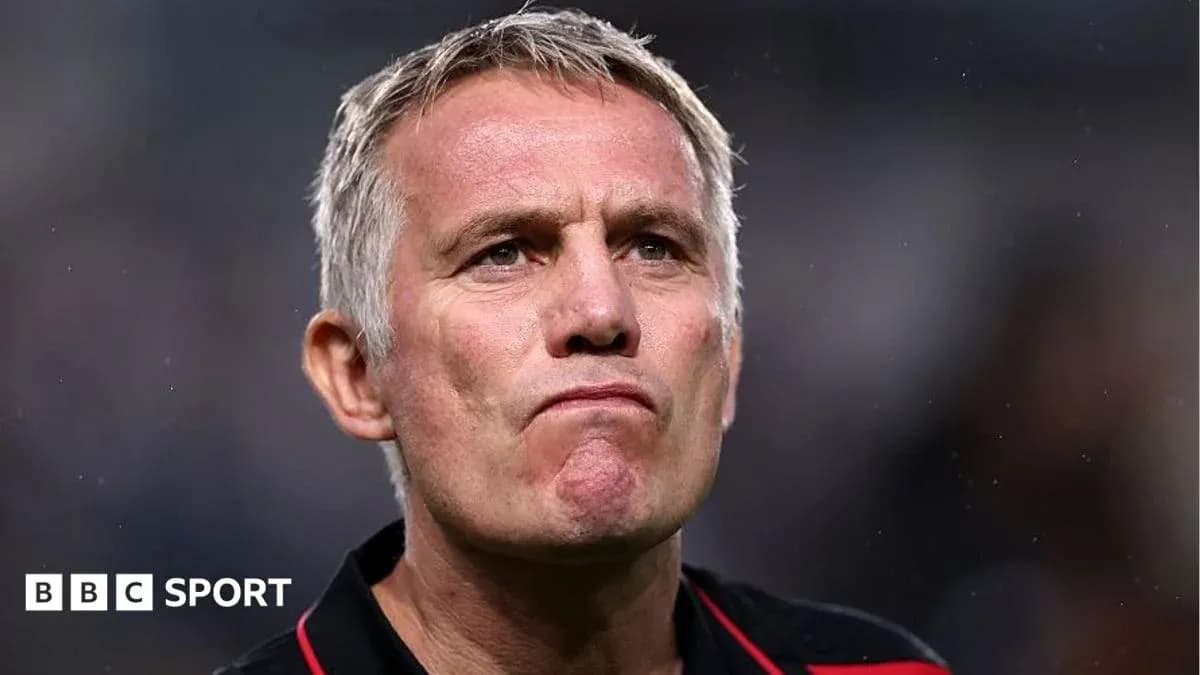 Coach looking on during a match